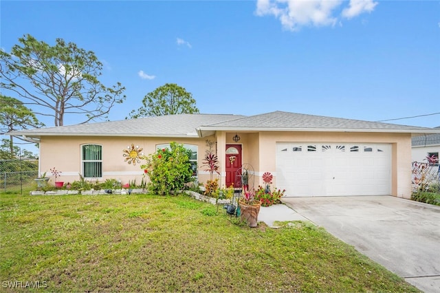 ranch-style home with a front yard and a garage