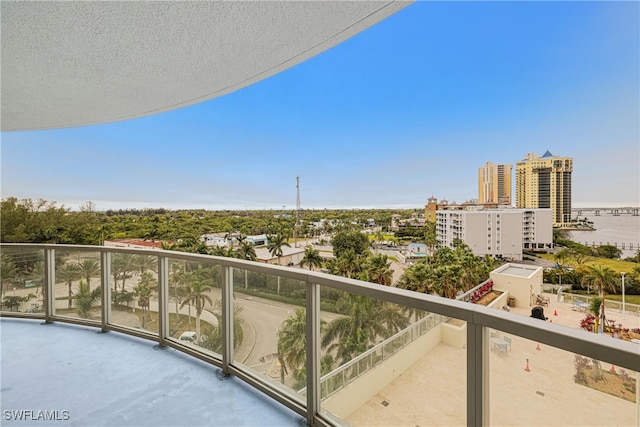 balcony featuring a water view