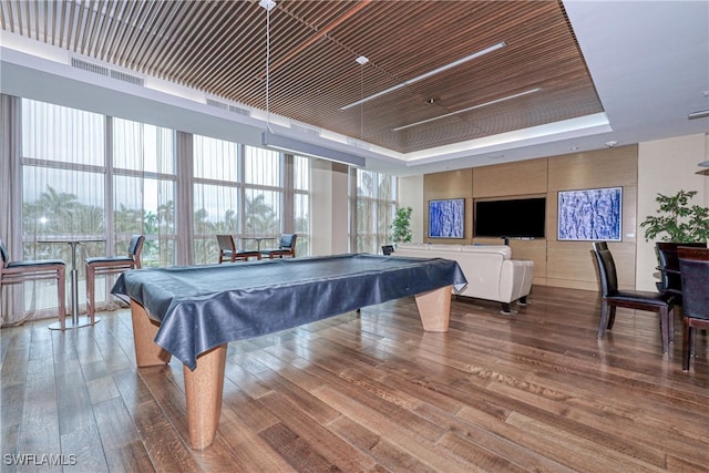 rec room with wooden ceiling, a raised ceiling, billiards, hardwood / wood-style floors, and floor to ceiling windows