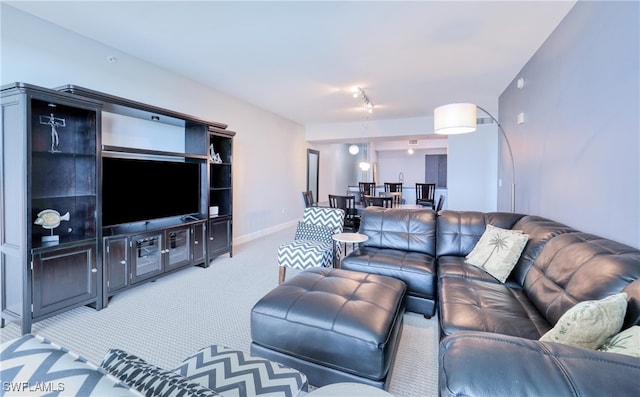 living room featuring light colored carpet