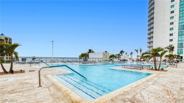 view of pool featuring a patio area