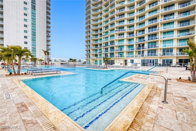 view of swimming pool featuring a patio