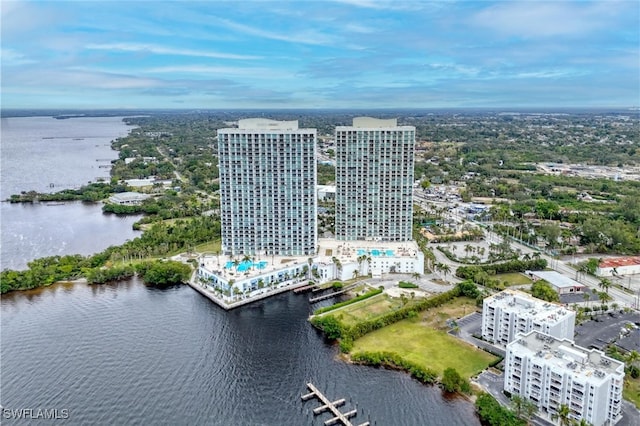 birds eye view of property featuring a water view