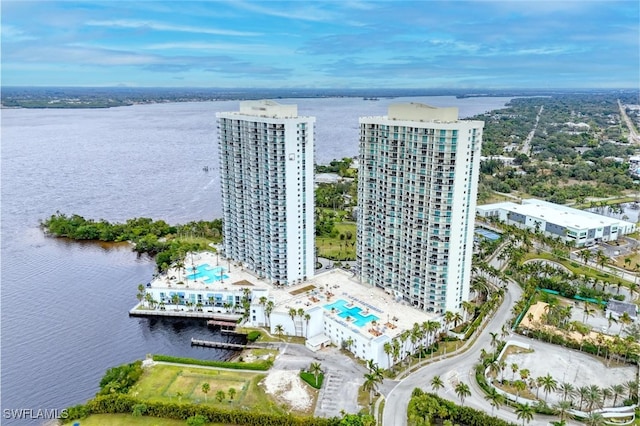 birds eye view of property with a water view