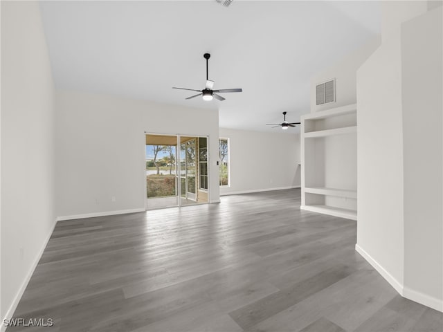 spare room featuring ceiling fan and hardwood / wood-style flooring