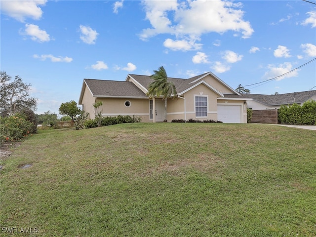 single story home featuring a garage and a front lawn