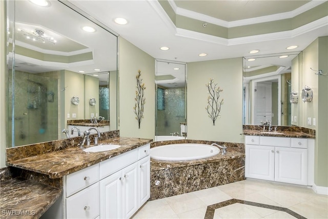 bathroom featuring shower with separate bathtub, crown molding, a raised ceiling, and vanity