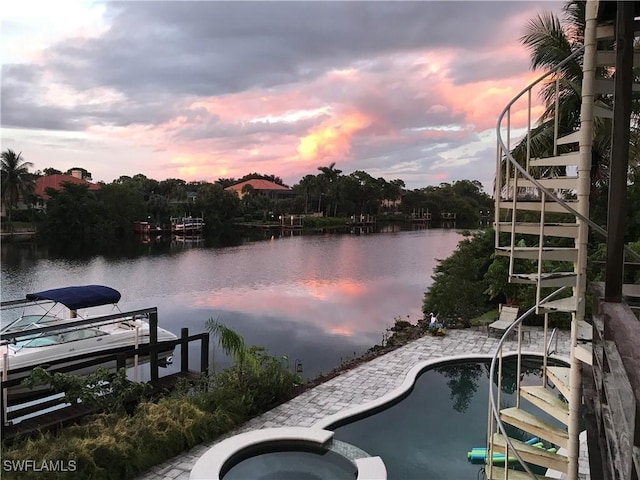 dock area featuring a water view