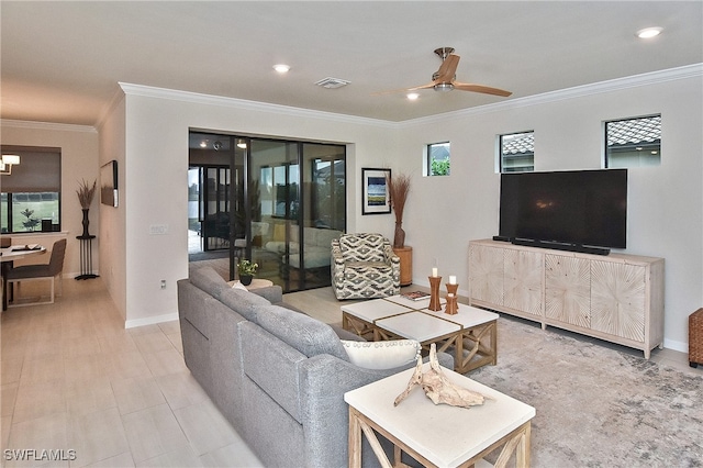 living room featuring ceiling fan and ornamental molding