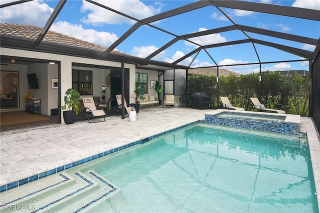 view of pool with a lanai, a patio area, area for grilling, and an in ground hot tub