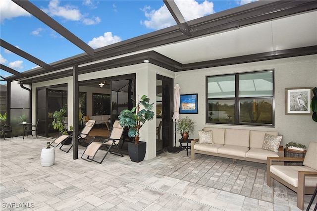 view of patio / terrace featuring a lanai and outdoor lounge area