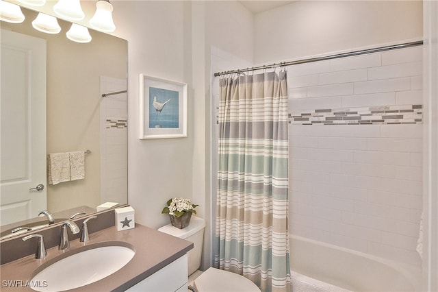 full bathroom featuring toilet, shower / bathtub combination with curtain, and vanity