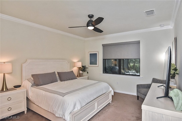 bedroom featuring visible vents, ornamental molding, a ceiling fan, carpet floors, and baseboards