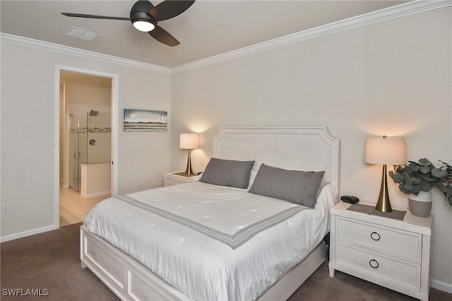 bedroom featuring visible vents, ensuite bathroom, ornamental molding, and dark carpet