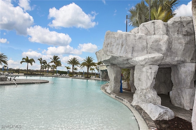 community pool with a water view