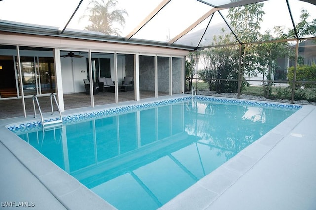 view of pool featuring an outdoor living space, a lanai, and ceiling fan