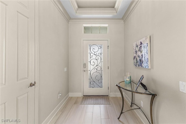 foyer featuring ornamental molding