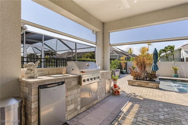 view of patio / terrace featuring grilling area, an outdoor kitchen, and a lanai