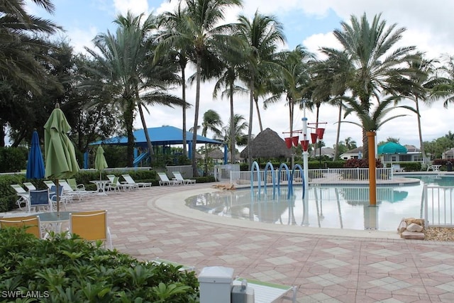 view of swimming pool with a patio area