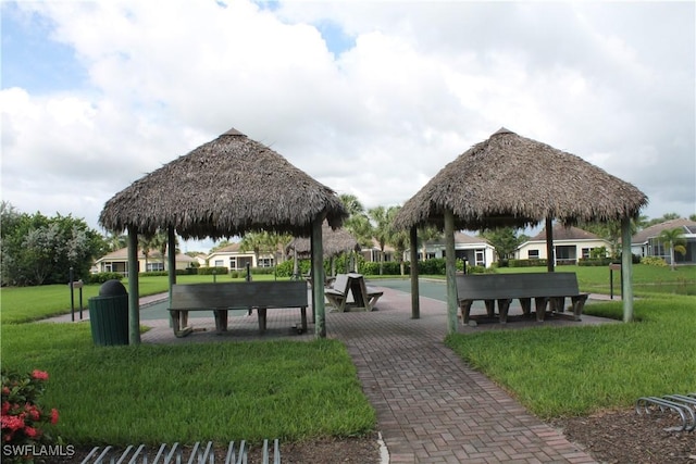 view of community featuring a lawn and a gazebo