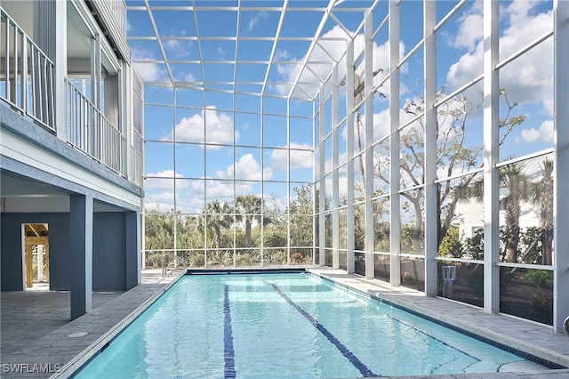 view of pool with a lanai