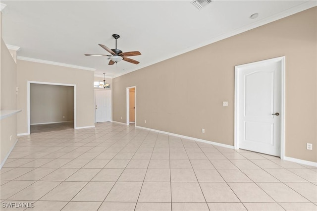 tiled empty room featuring ceiling fan with notable chandelier and crown molding