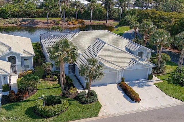 drone / aerial view with a water view