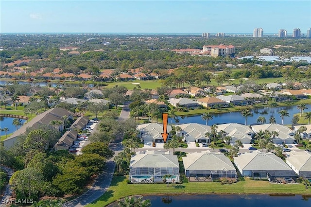 birds eye view of property featuring a water view