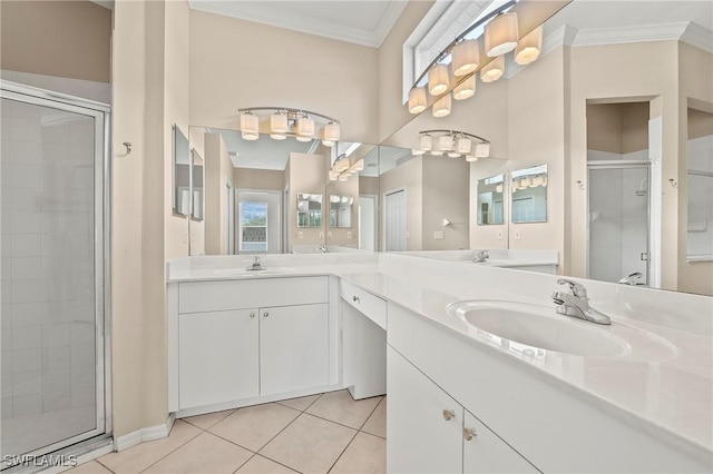 bathroom featuring vanity, tile patterned flooring, crown molding, and a shower with shower door