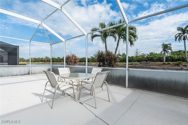 view of patio / terrace with a lanai