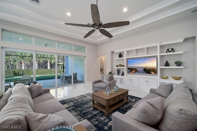 living room featuring a raised ceiling, ceiling fan, and crown molding