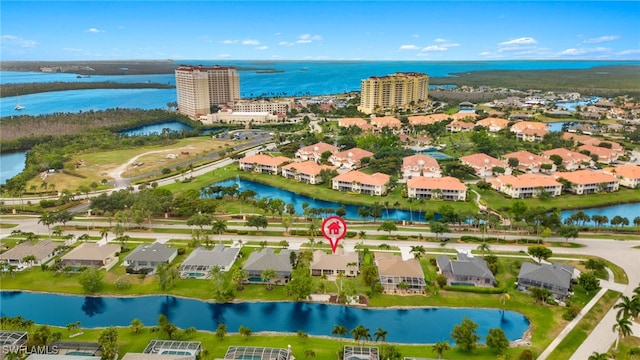 birds eye view of property featuring a water view