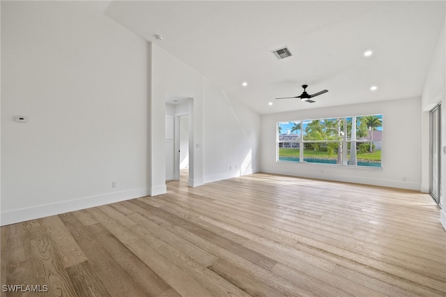 unfurnished living room with ceiling fan and light hardwood / wood-style floors