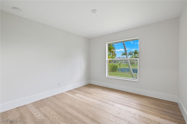 empty room with light wood-type flooring