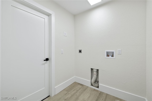 laundry area featuring light hardwood / wood-style flooring, hookup for an electric dryer, and hookup for a washing machine