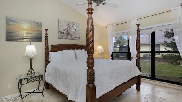 bedroom with ceiling fan and lofted ceiling