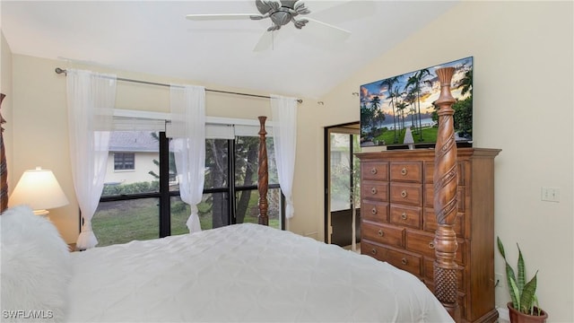 bedroom featuring multiple windows, vaulted ceiling, ceiling fan, and access to outside