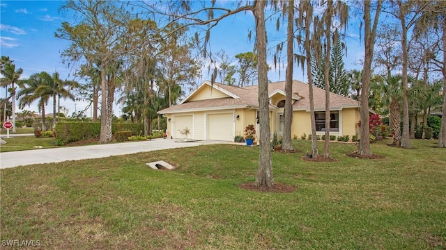 view of front of home featuring a garage and a front yard