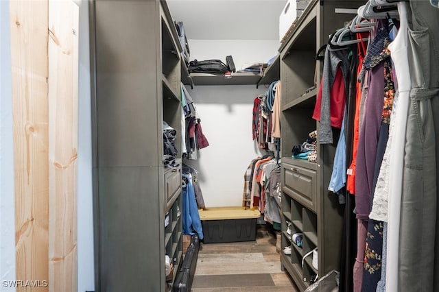 walk in closet featuring light wood-type flooring