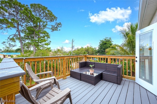 deck featuring an outdoor living space