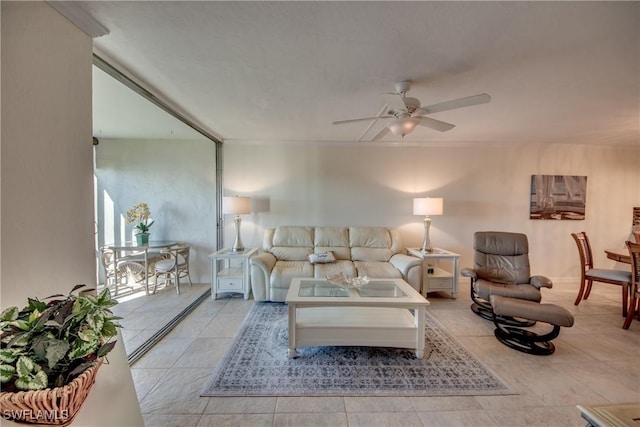 tiled living room featuring ceiling fan