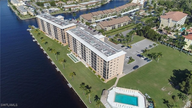 birds eye view of property featuring a water view