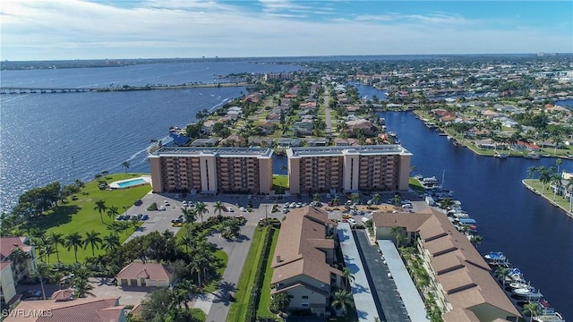 drone / aerial view with a water view