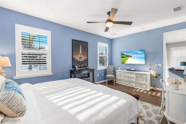 bedroom featuring ceiling fan and hardwood / wood-style flooring