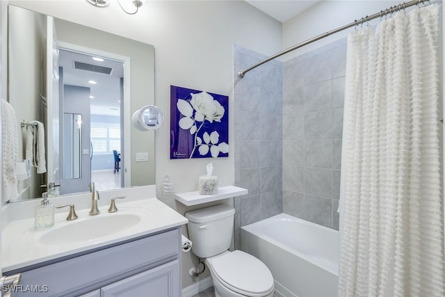 full bathroom with shower / bath combination with curtain, vanity, and toilet