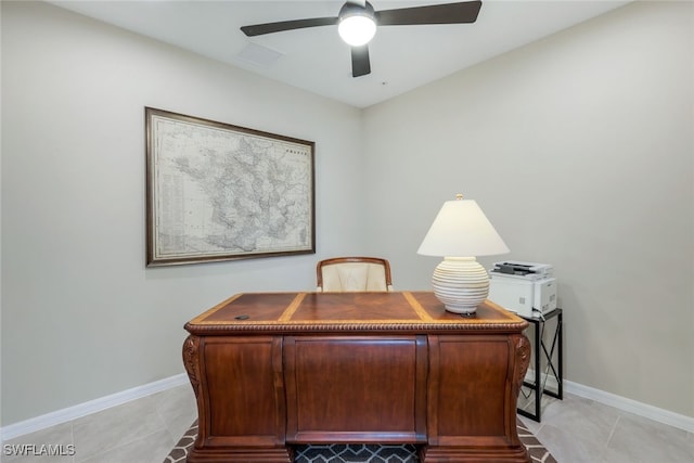 tiled office space with ceiling fan