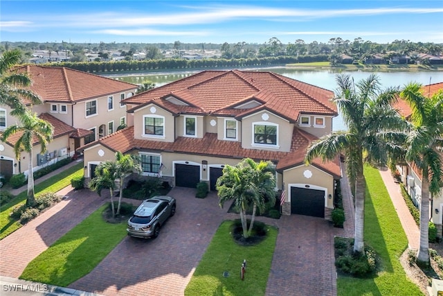 drone / aerial view with a water view