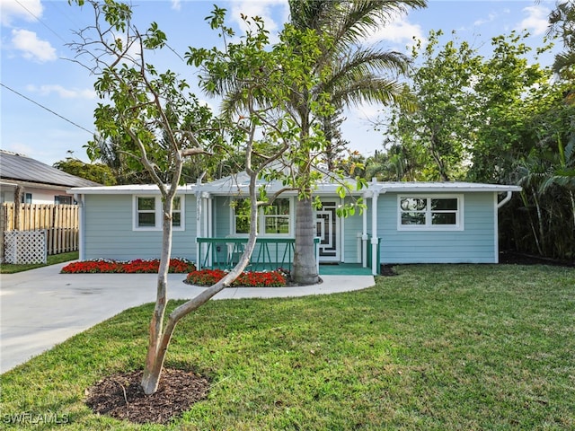 ranch-style house with a front yard