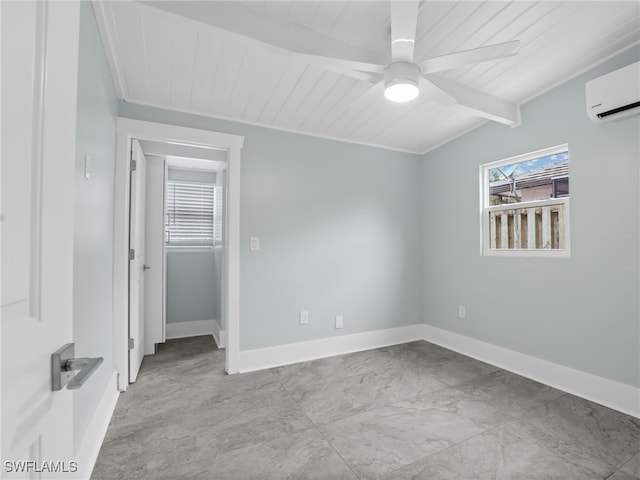 empty room featuring ceiling fan, a healthy amount of sunlight, lofted ceiling with beams, and a wall unit AC