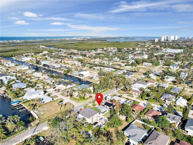 aerial view with a water view and a residential view